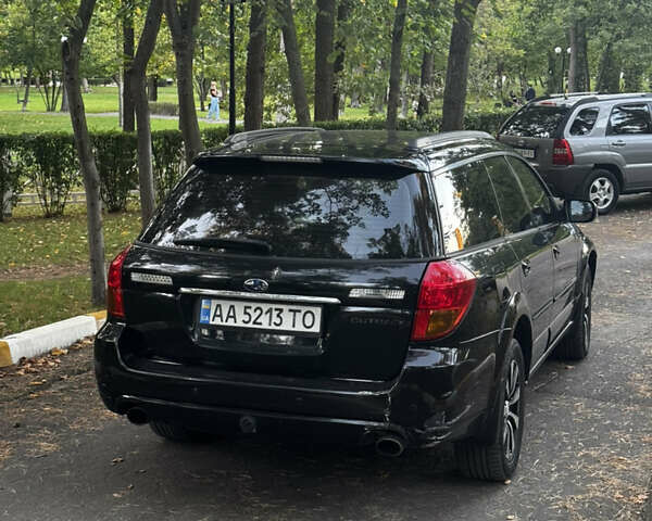 Черный Субару Аутбек, объемом двигателя 3 л и пробегом 301 тыс. км за 6500 $, фото 2 на Automoto.ua