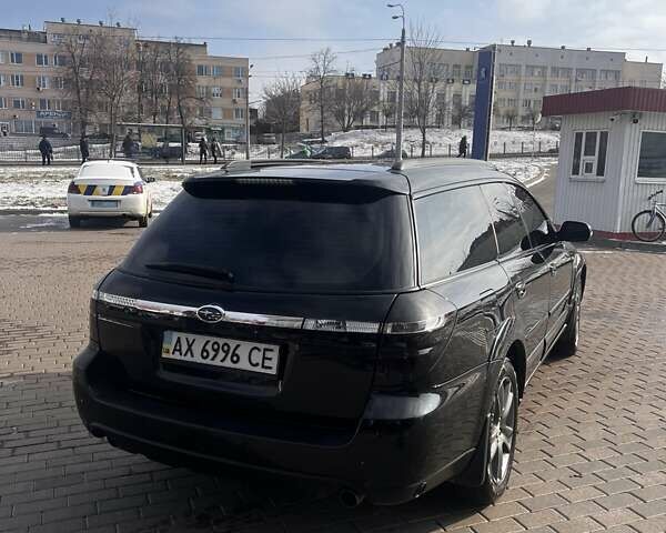 Черный Субару Аутбек, объемом двигателя 2.5 л и пробегом 270 тыс. км за 7400 $, фото 3 на Automoto.ua