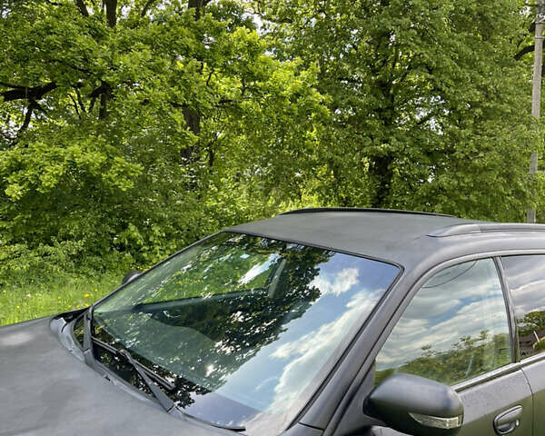 Чорний Субару Аутбек, об'ємом двигуна 2.46 л та пробігом 321 тис. км за 6600 $, фото 1 на Automoto.ua