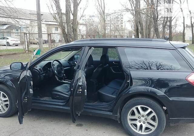 Черный Субару Аутбек, объемом двигателя 2.5 л и пробегом 173 тыс. км за 8000 $, фото 6 на Automoto.ua