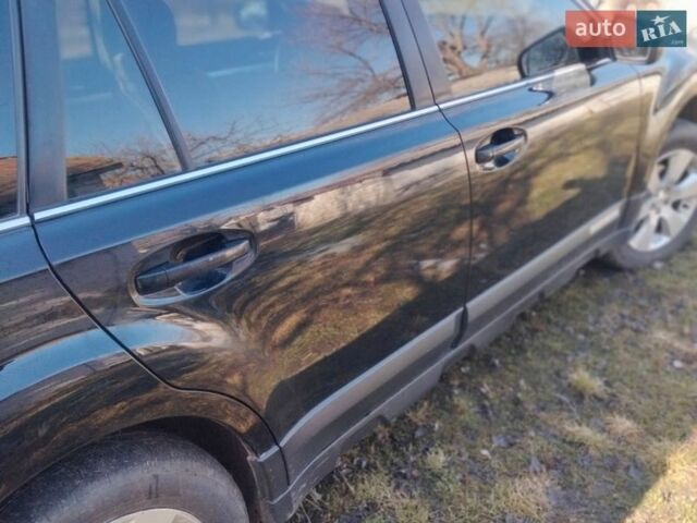 Черный Субару Аутбек, объемом двигателя 2.46 л и пробегом 424 тыс. км за 8300 $, фото 6 на Automoto.ua