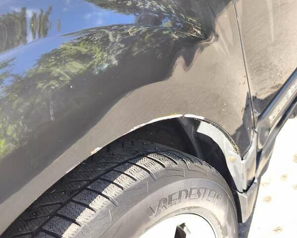 Черный Субару Аутбек, объемом двигателя 2.46 л и пробегом 230 тыс. км за 7300 $, фото 6 на Automoto.ua