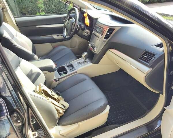 Черный Субару Аутбек, объемом двигателя 2.46 л и пробегом 230 тыс. км за 7300 $, фото 3 на Automoto.ua