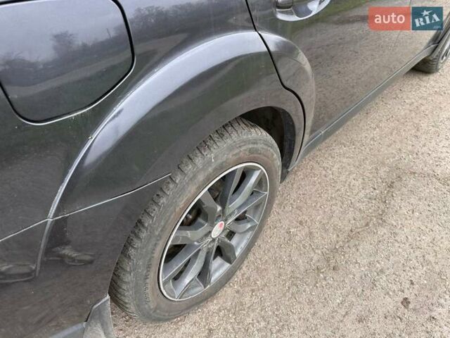 Черный Субару Аутбек, объемом двигателя 2.2 л и пробегом 223 тыс. км за 11000 $, фото 1 на Automoto.ua