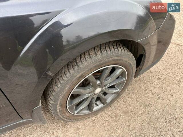 Черный Субару Аутбек, объемом двигателя 2.2 л и пробегом 223 тыс. км за 11000 $, фото 3 на Automoto.ua