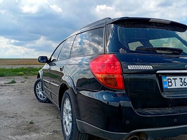 Чорний Субару Аутбек, об'ємом двигуна 2.5 л та пробігом 200 тис. км за 5999 $, фото 1 на Automoto.ua