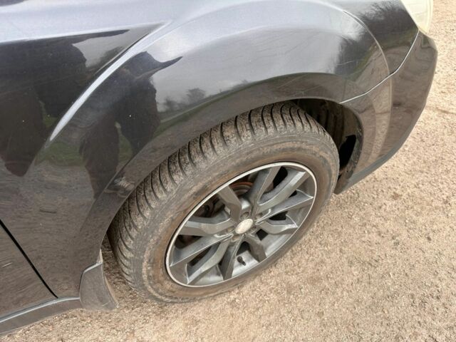 Черный Субару Аутбек, объемом двигателя 2.2 л и пробегом 223 тыс. км за 11000 $, фото 7 на Automoto.ua