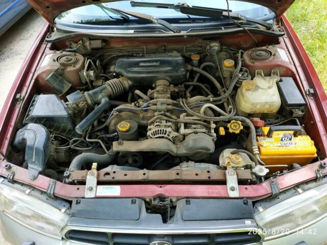 Червоний Субару Аутбек, об'ємом двигуна 2.5 л та пробігом 366 тис. км за 2000 $, фото 16 на Automoto.ua