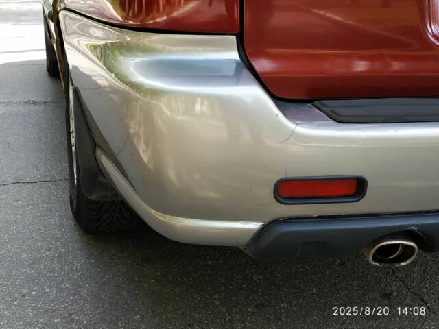 Червоний Субару Аутбек, об'ємом двигуна 2.5 л та пробігом 366 тис. км за 2000 $, фото 3 на Automoto.ua