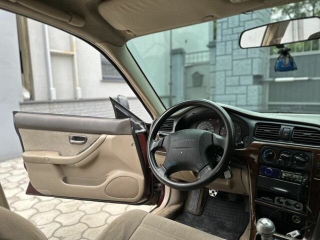 Красный Субару Аутбек, объемом двигателя 2.5 л и пробегом 2 тыс. км за 4300 $, фото 6 на Automoto.ua