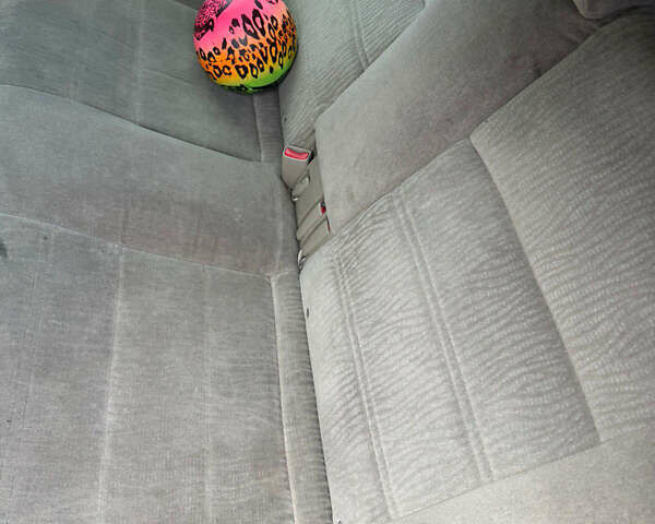 Красный Субару Аутбек, объемом двигателя 2.5 л и пробегом 300 тыс. км за 3400 $, фото 4 на Automoto.ua