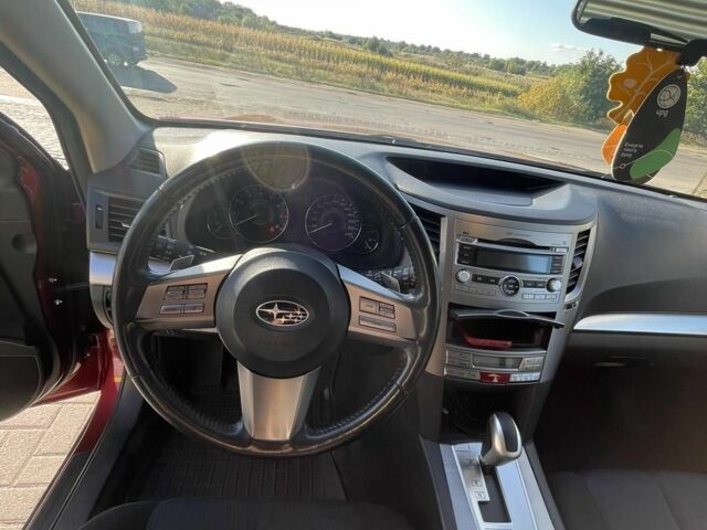 Красный Субару Аутбек, объемом двигателя 2.5 л и пробегом 105 тыс. км за 9999 $, фото 1 на Automoto.ua