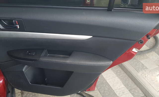 Красный Субару Аутбек, объемом двигателя 2.5 л и пробегом 192 тыс. км за 8500 $, фото 5 на Automoto.ua