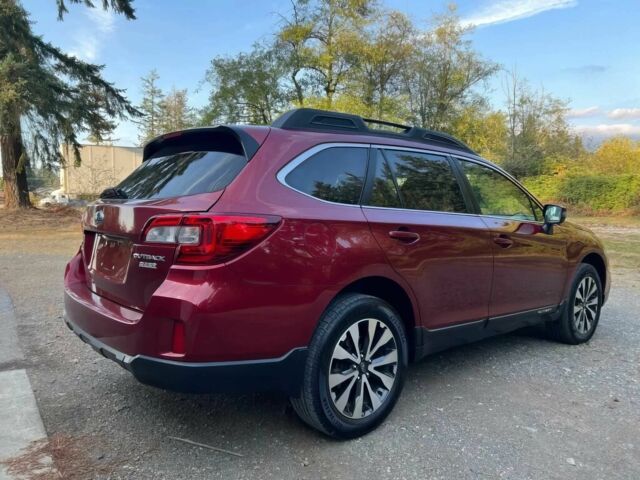 Красный Субару Аутбек, объемом двигателя 2.5 л и пробегом 77 тыс. км за 2000 $, фото 6 на Automoto.ua