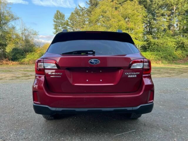 Красный Субару Аутбек, объемом двигателя 2.5 л и пробегом 77 тыс. км за 2000 $, фото 5 на Automoto.ua