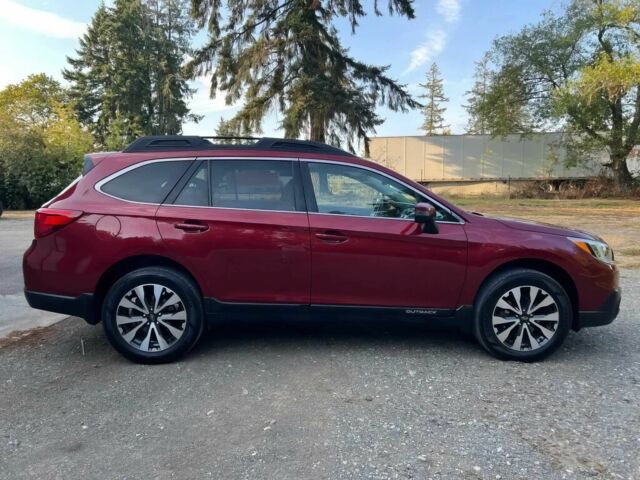 Красный Субару Аутбек, объемом двигателя 2.5 л и пробегом 77 тыс. км за 2000 $, фото 7 на Automoto.ua