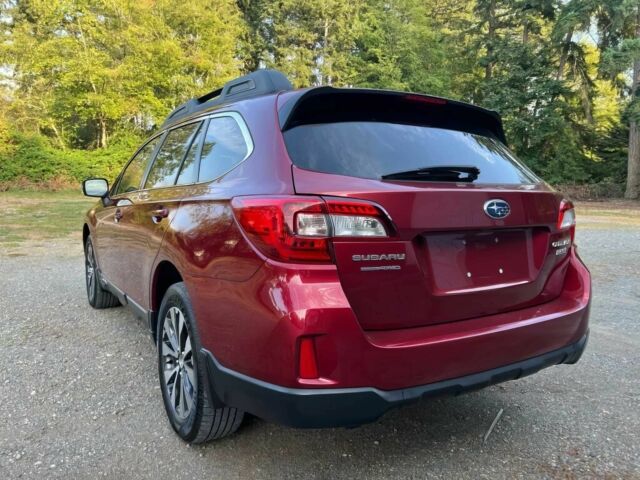 Красный Субару Аутбек, объемом двигателя 2.5 л и пробегом 77 тыс. км за 2000 $, фото 4 на Automoto.ua