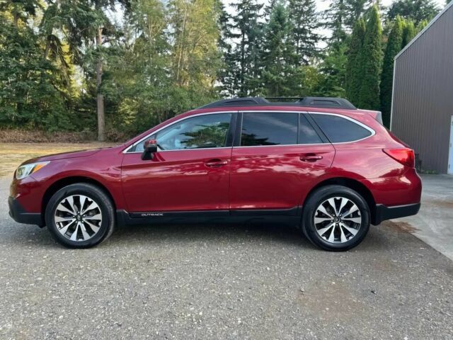 Красный Субару Аутбек, объемом двигателя 2.5 л и пробегом 77 тыс. км за 2000 $, фото 3 на Automoto.ua