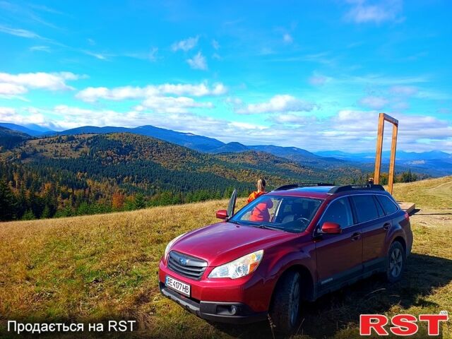 Красный Субару Аутбек, объемом двигателя 2.5 л и пробегом 260 тыс. км за 10500 $, фото 1 на Automoto.ua