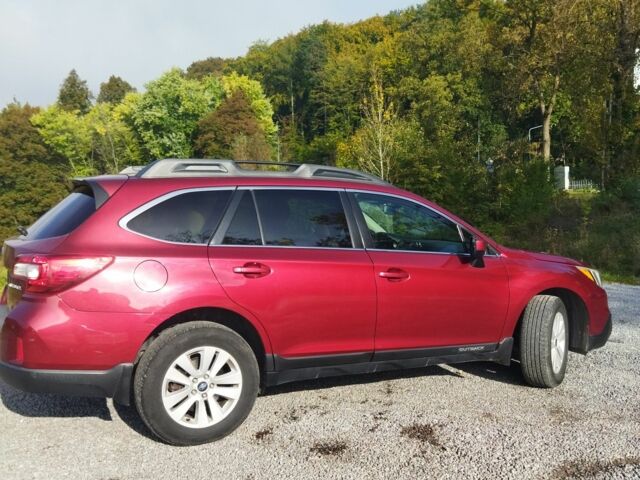 Красный Субару Аутбек, объемом двигателя 2.5 л и пробегом 168 тыс. км за 14300 $, фото 5 на Automoto.ua