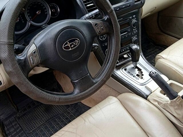 Серый Субару Аутбек, объемом двигателя 3 л и пробегом 270 тыс. км за 5500 $, фото 3 на Automoto.ua