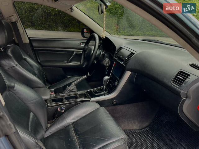 Синий Субару Аутбек, объемом двигателя 3 л и пробегом 235 тыс. км за 6800 $, фото 7 на Automoto.ua