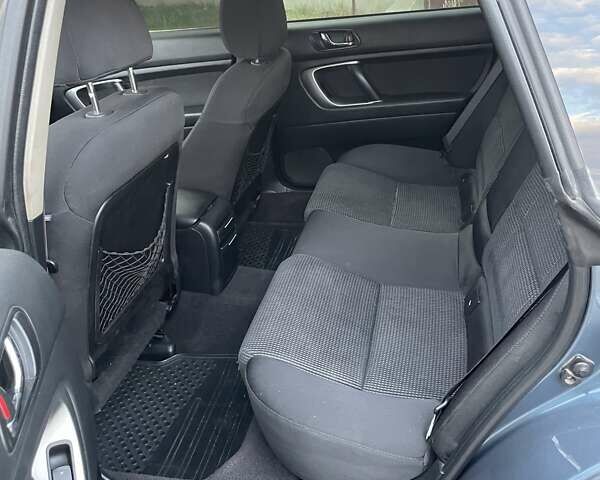 Синий Субару Аутбек, объемом двигателя 2.46 л и пробегом 200 тыс. км за 5199 $, фото 2 на Automoto.ua