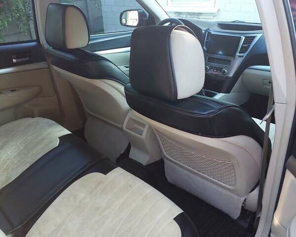 Синий Субару Аутбек, объемом двигателя 2.46 л и пробегом 300 тыс. км за 7500 $, фото 4 на Automoto.ua