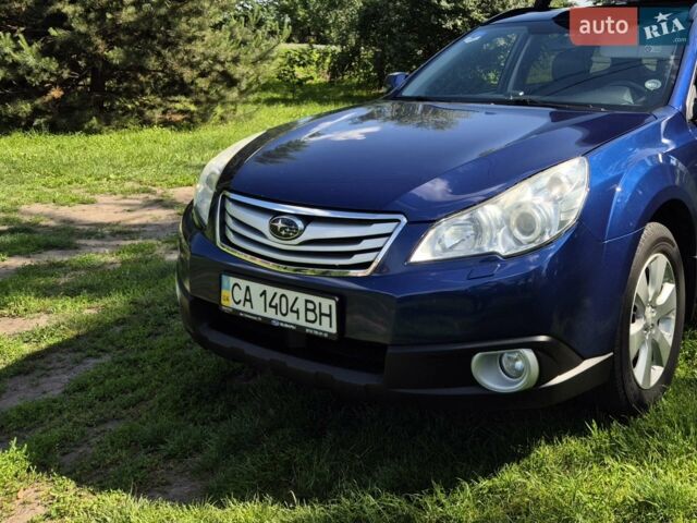 Синий Субару Аутбек, объемом двигателя 2.46 л и пробегом 295 тыс. км за 9100 $, фото 1 на Automoto.ua