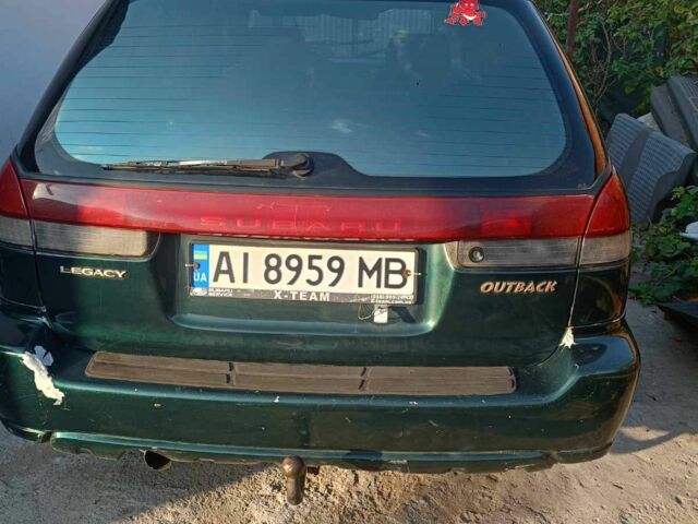 Зеленый Субару Аутбек, объемом двигателя 2.5 л и пробегом 305 тыс. км за 2200 $, фото 2 на Automoto.ua