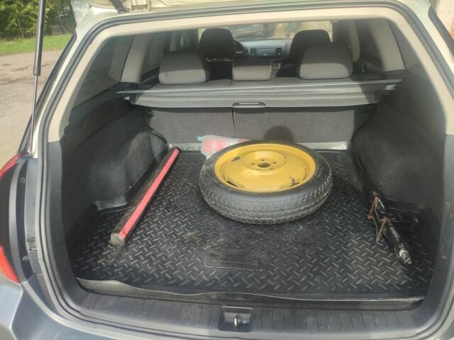 Зеленый Субару Аутбек, объемом двигателя 2.5 л и пробегом 288 тыс. км за 5500 $, фото 6 на Automoto.ua