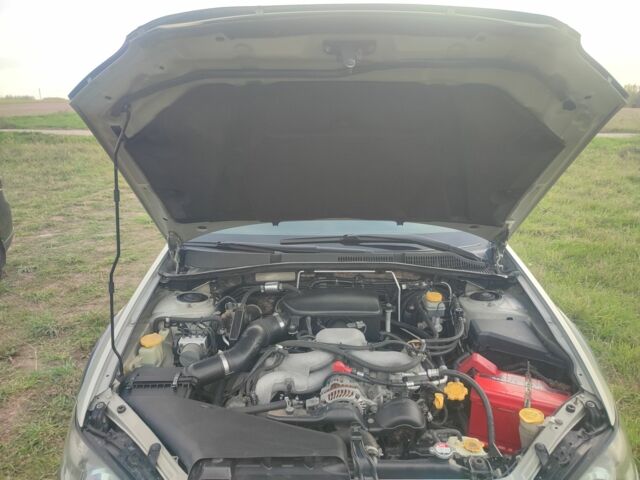 Зеленый Субару Аутбек, объемом двигателя 2.5 л и пробегом 288 тыс. км за 5500 $, фото 1 на Automoto.ua