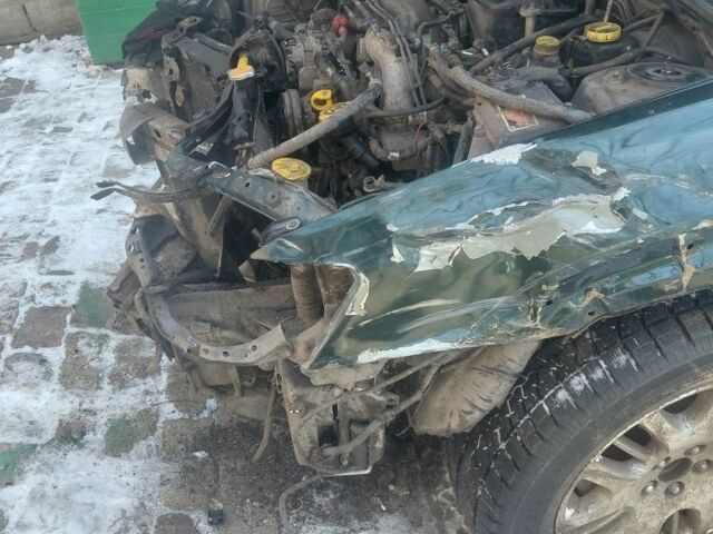 Зелений Субару Аутбек, об'ємом двигуна 2.5 л та пробігом 361 тис. км за 2000 $, фото 2 на Automoto.ua