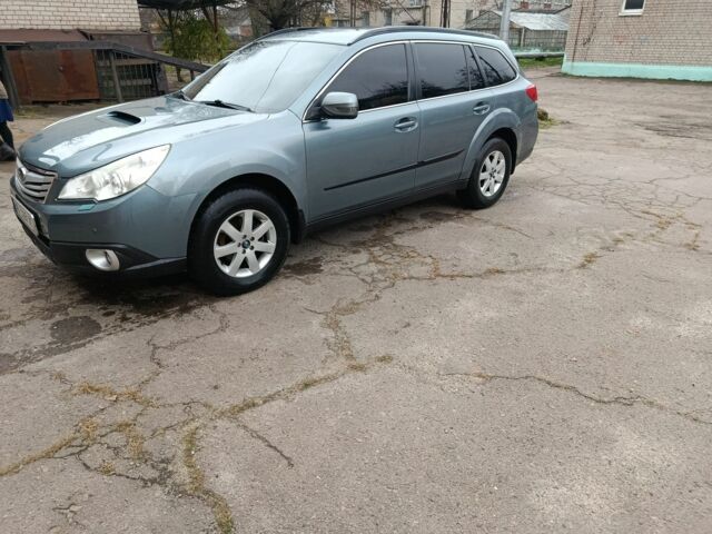 Зеленый Субару Аутбек, объемом двигателя 2 л и пробегом 289 тыс. км за 8500 $, фото 1 на Automoto.ua