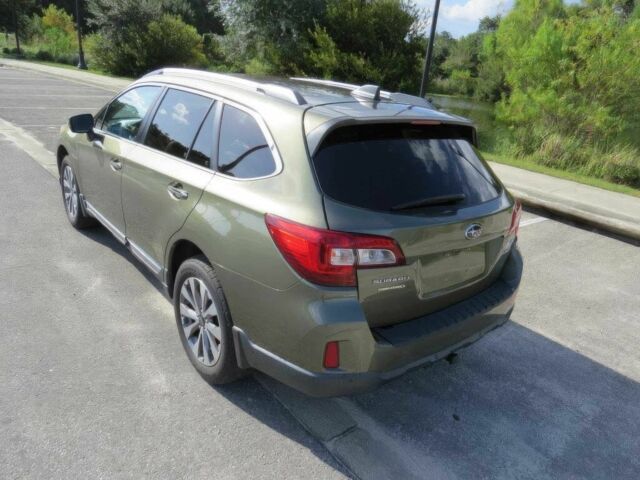 Зеленый Субару Аутбек, объемом двигателя 3.6 л и пробегом 63 тыс. км за 6900 $, фото 3 на Automoto.ua