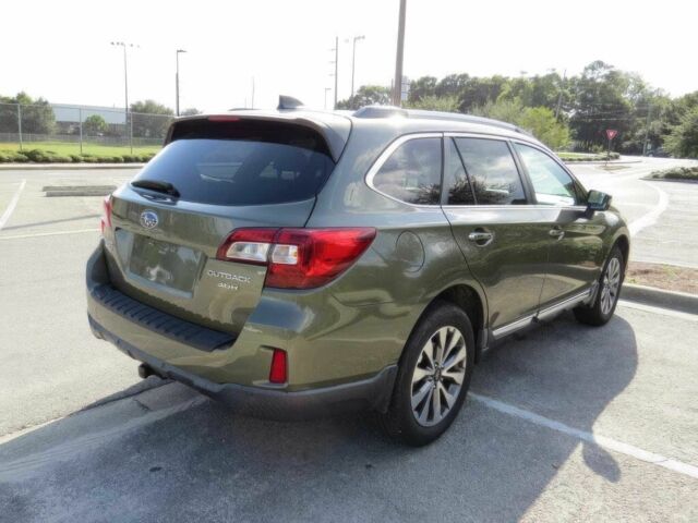 Зеленый Субару Аутбек, объемом двигателя 3.6 л и пробегом 63 тыс. км за 6900 $, фото 4 на Automoto.ua