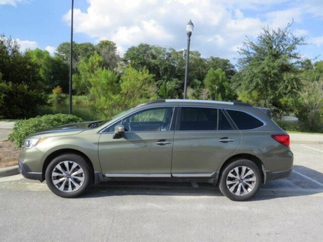 Зеленый Субару Аутбек, объемом двигателя 3.6 л и пробегом 63 тыс. км за 6900 $, фото 2 на Automoto.ua