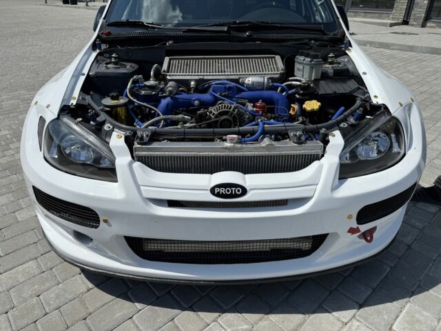 Білий Субару ХТ, об'ємом двигуна 2 л та пробігом 10 тис. км за 60000 $, фото 7 на Automoto.ua