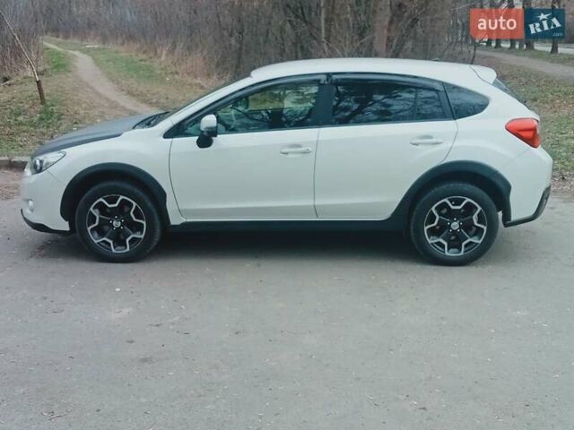 Білий Субару ХВ, об'ємом двигуна 2 л та пробігом 250 тис. км за 8800 $, фото 6 на Automoto.ua