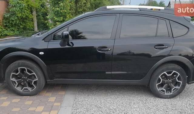 Черный Субару ХВ, объемом двигателя 2 л и пробегом 184 тыс. км за 10000 $, фото 1 на Automoto.ua
