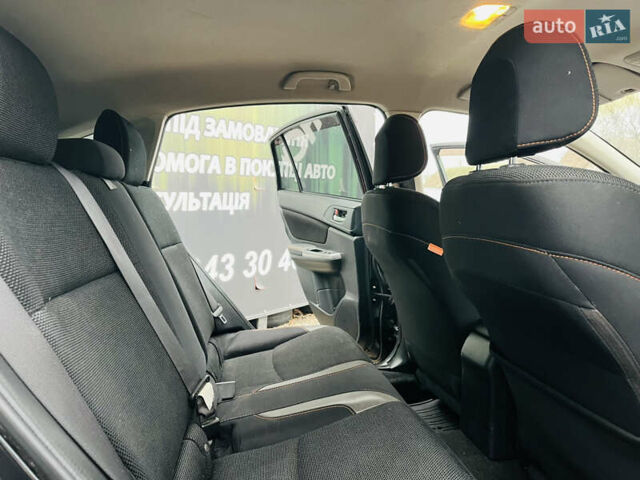 Черный Субару Crosstrek, объемом двигателя 2 л и пробегом 180 тыс. км за 7500 $, фото 16 на Automoto.ua