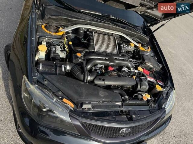 Чорний Субару Impreza WRX, об'ємом двигуна 2.46 л та пробігом 184 тис. км за 11200 $, фото 11 на Automoto.ua