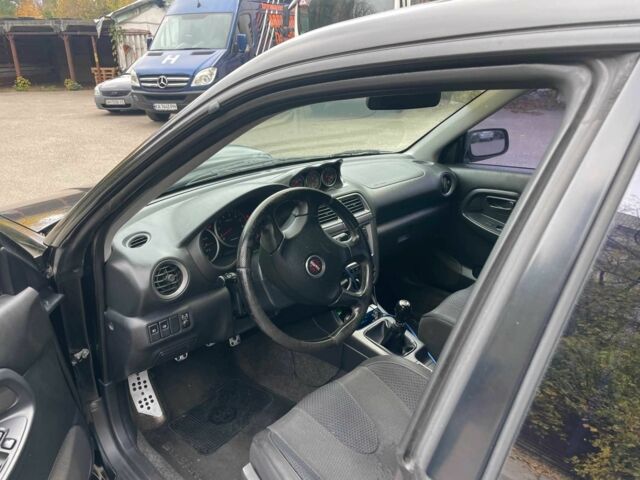 Чорний Субару Impreza WRX, об'ємом двигуна 2 л та пробігом 190 тис. км за 6500 $, фото 2 на Automoto.ua