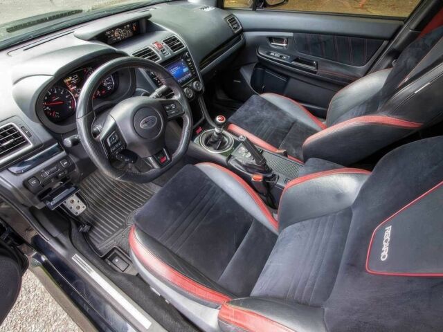 Черный Субару Impreza WRX, объемом двигателя 2.5 л и пробегом 56 тыс. км за 12000 $, фото 7 на Automoto.ua