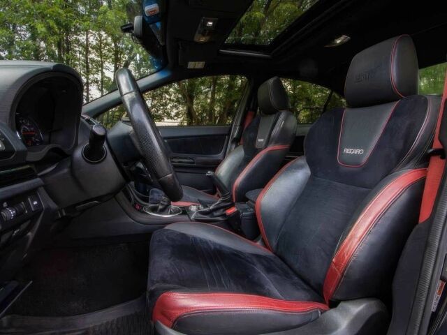 Черный Субару Impreza WRX, объемом двигателя 2.5 л и пробегом 56 тыс. км за 12000 $, фото 6 на Automoto.ua
