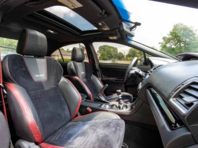 Черный Субару Impreza WRX, объемом двигателя 2.5 л и пробегом 56 тыс. км за 12000 $, фото 13 на Automoto.ua