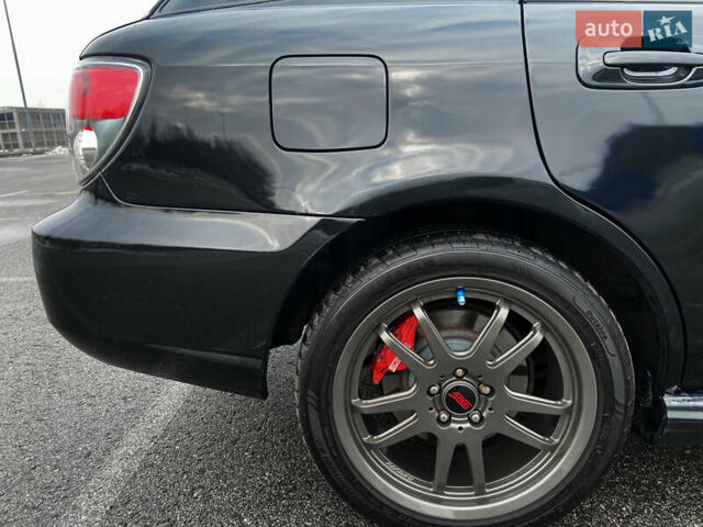 Черный Субару Impreza WRX, объемом двигателя 2.46 л и пробегом 288 тыс. км за 7500 $, фото 13 на Automoto.ua