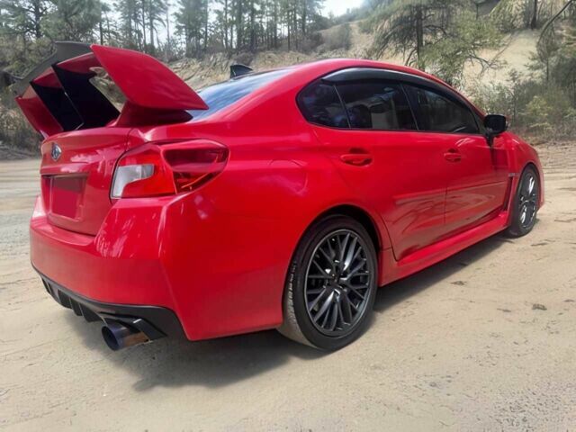 Субару Impreza WRX 2016 у Дніпро (Дніпропетровську) на Automoto.ua Червоний Субару Impreza WRX, об'ємом двигуна 2.5 л та пробігом 73 тис. км за 4500 $, фото 4 на Automoto.ua