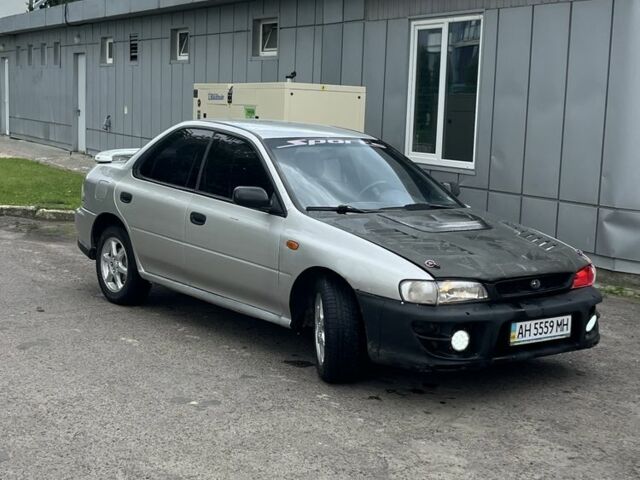 Серый Субару Impreza WRX, объемом двигателя 2 л и пробегом 250 тыс. км за 1700 $, фото 1 на Automoto.ua