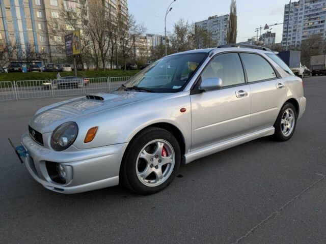 Серый Субару Impreza WRX, объемом двигателя 2 л и пробегом 222 тыс. км за 12000 $, фото 6 на Automoto.ua